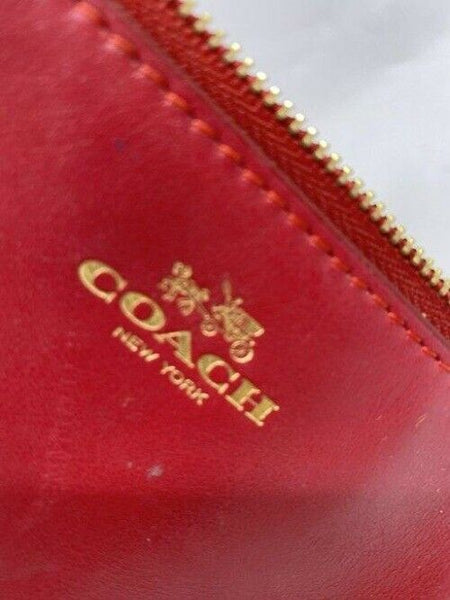 coach double needs strap red wristlet