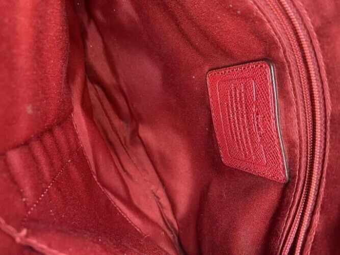 coach all over logo red coated canvas cross body bag