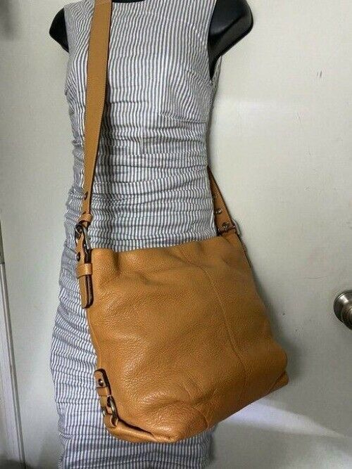 Coach medium orange leather cross body bag