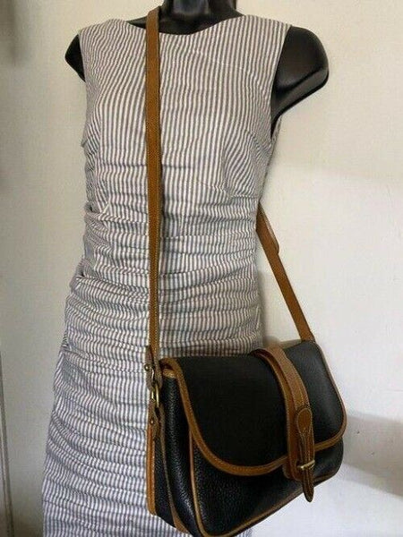 Dooney and Bourke vintage black tan leather cross body bag