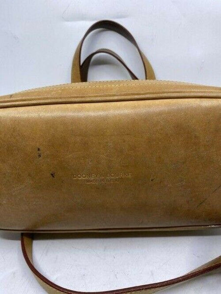 Dooney and Bourke large perforated handbag black tan leather cross body bag