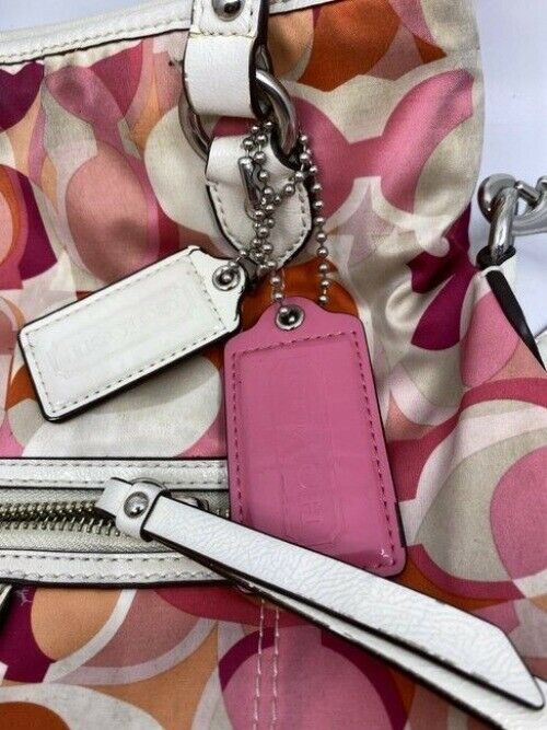 Coach Multi Purpose Pink Fabric Cross Body Bag