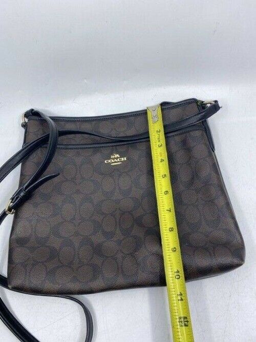 coach large brown coated canvas cross body bag
