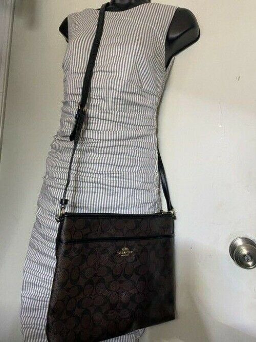 coach large brown coated canvas cross body bag