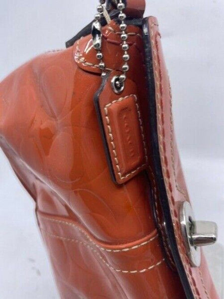 Coach Top Clasp Orange Patent Leather Wristlet