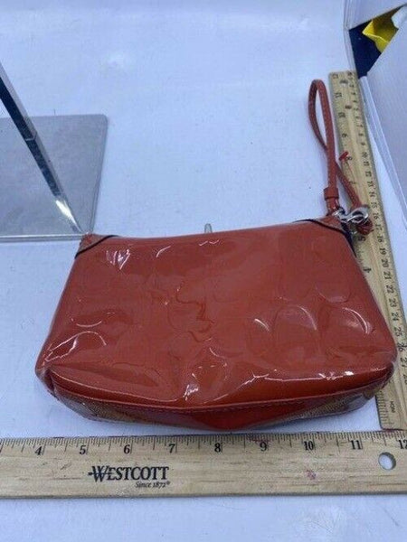 Coach Top Clasp Orange Patent Leather Wristlet