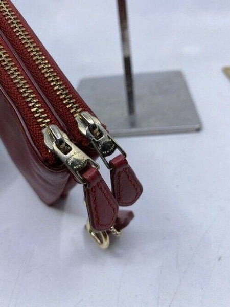 coach double needs strap red wristlet