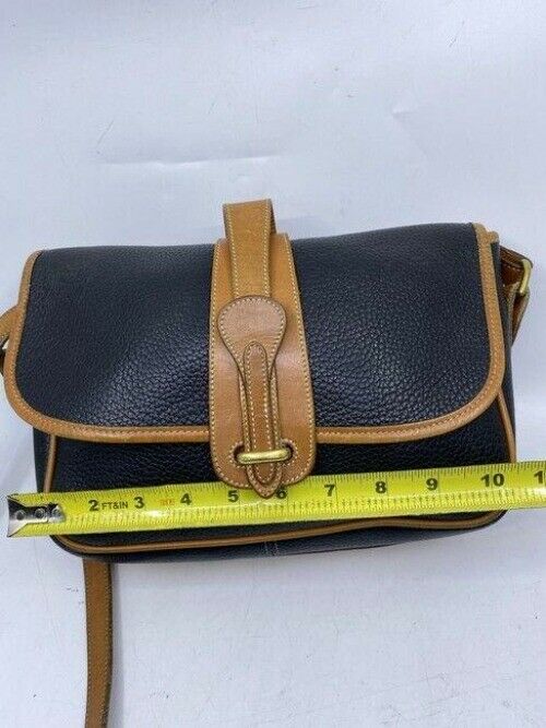 Dooney and Bourke vintage black tan leather cross body bag