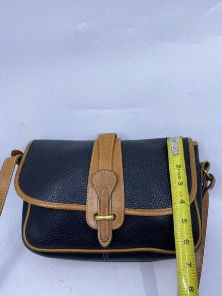 Dooney and Bourke vintage black tan leather cross body bag