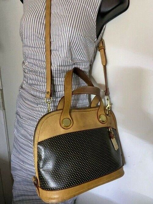 Dooney and Bourke large perforated handbag black tan leather cross body bag