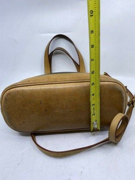 Dooney and Bourke large perforated handbag black tan leather cross body bag