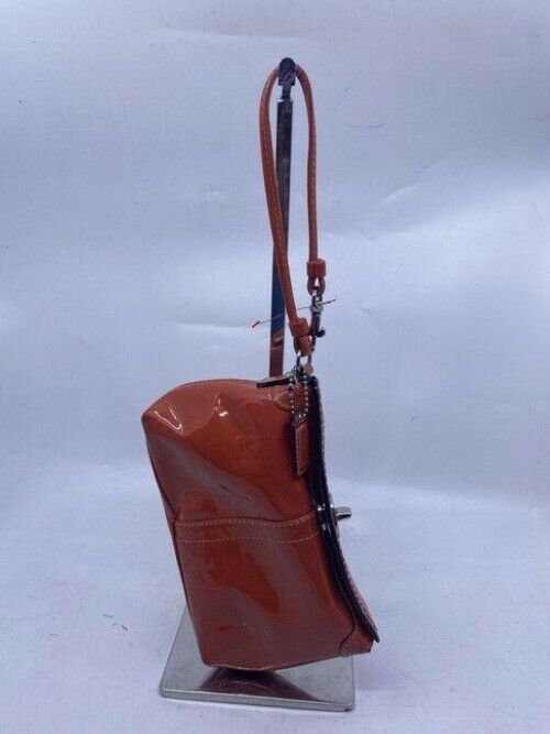 Coach Top Clasp Orange Patent Leather Wristlet