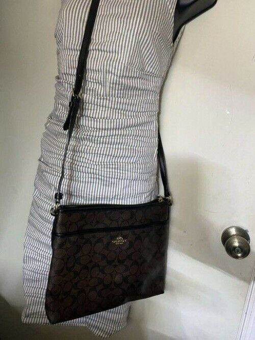 coach large brown coated canvas cross body bag