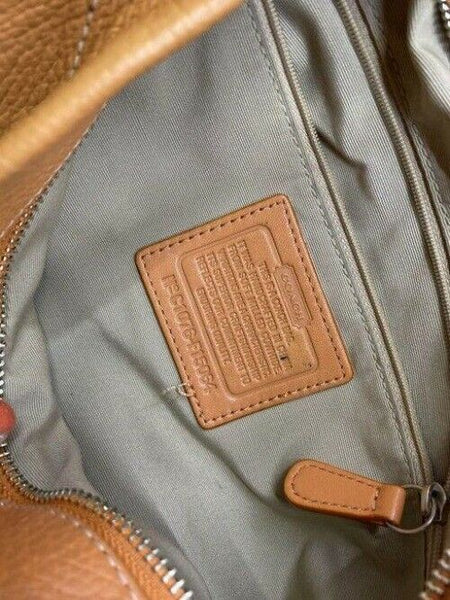 Coach medium orange leather cross body bag