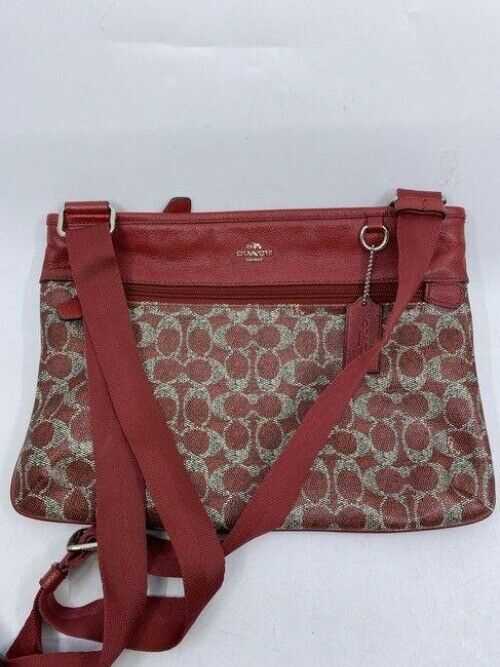 coach all over logo red coated canvas cross body bag