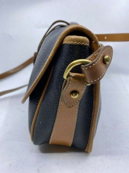 Dooney and Bourke vintage black tan leather cross body bag